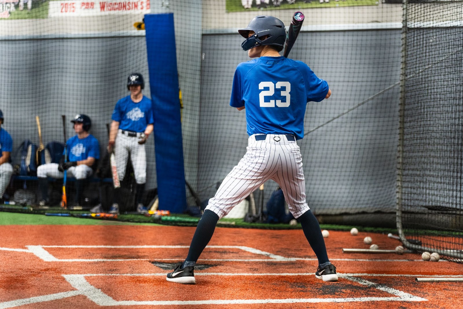 Boy at the hitters box.